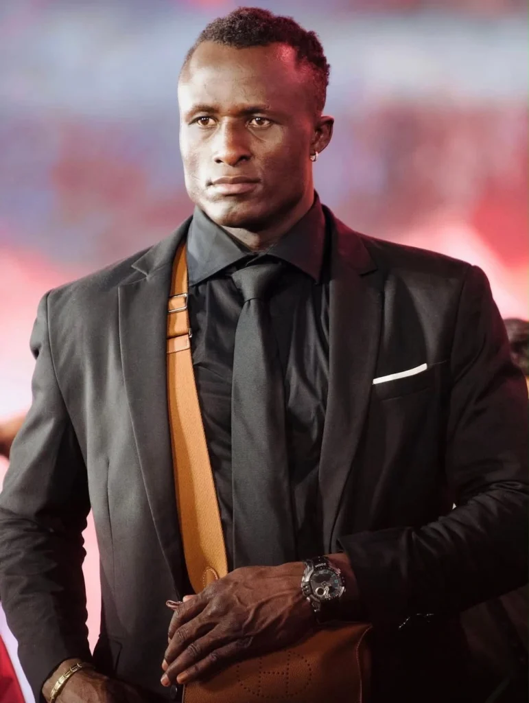 Kevin Kunta, the celebrity bodyguard of Ram Charan and professional MMA fighter, including his age, height, wife, net worth and MMA record.