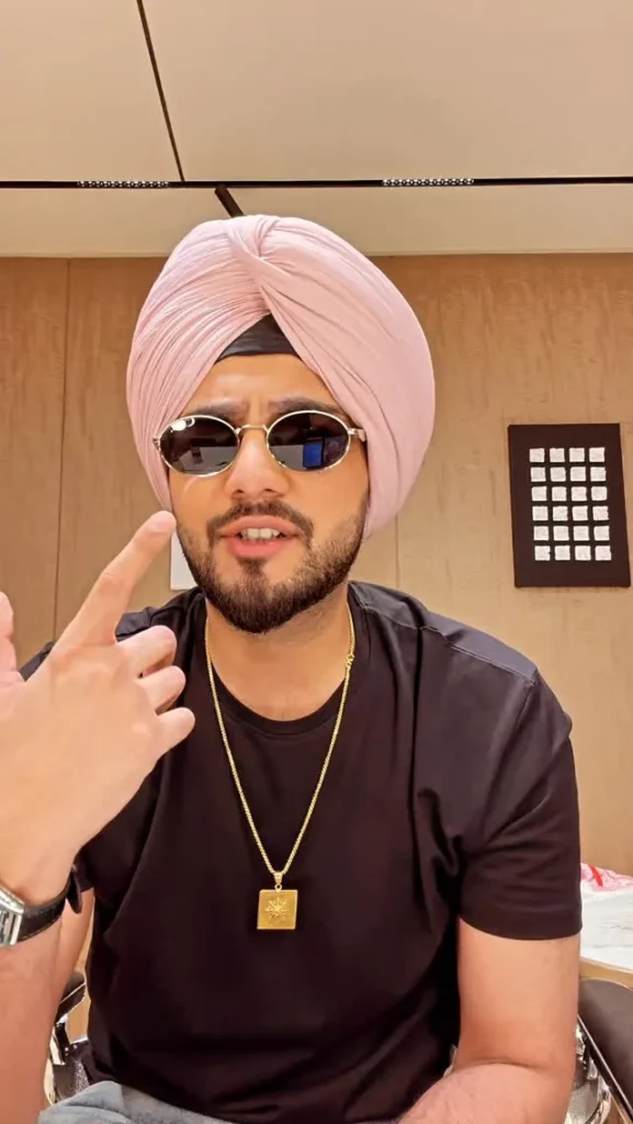 Elvish Yadav sporting a stylish and dapper outfit during a hit music video shoot.