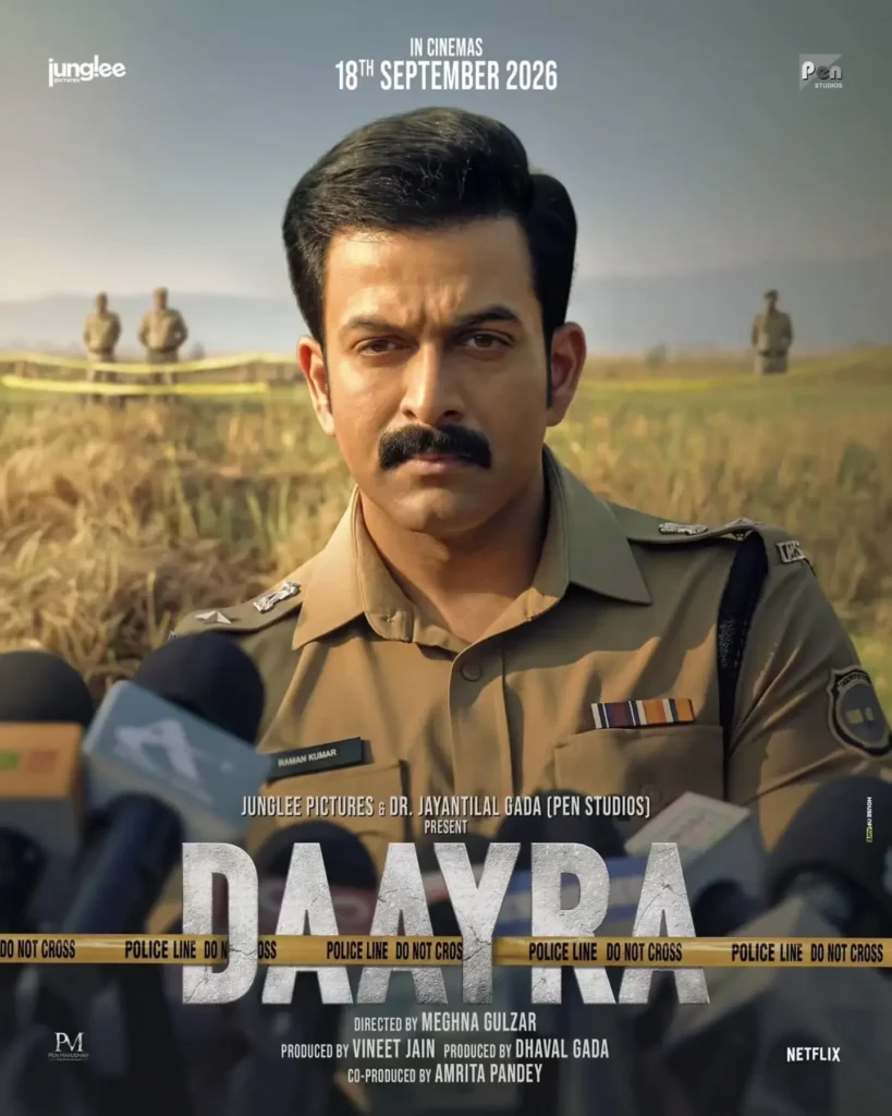 Prithviraj Sukumaran as DCP Raman Kumar facing press mics in the solo first look poster of Meghna Gulzar investigative thriller Daayra.